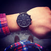 Guma' edition watch. All black watch with stainless steel mesh band